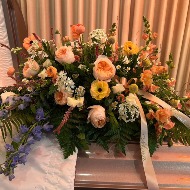 A soft farewell Casket Spray