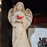 Resin angel with cardinal figurine