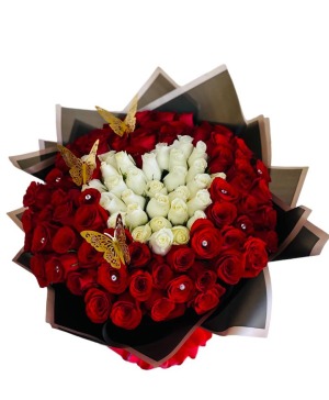 100 roses w/ white heart in the middle 