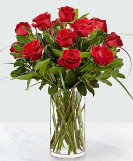 12 Quality Red Roses with Greens in Vase 
