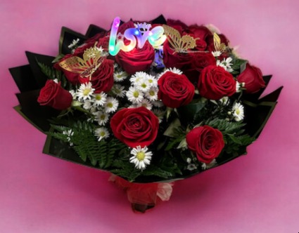 2 DZ OF ROSES WRAPPED IN PAPER 