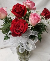 3 Red and 3 Pink Roses arranged in a vase (R) with seasonal Filler and Bow!