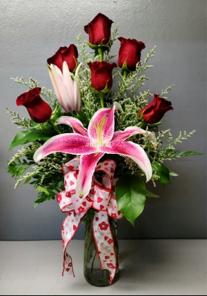 6 red roses and a starfighter lily Fresh Flower Arrangement 