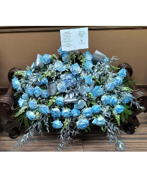 Calmness of Blue  Blue Roses, Blue Hydrangea, Baby Breath, White Snaps, Silver Italian Ruscus, Silver Aspidistra Leaves, Jade, Leather Leaf.