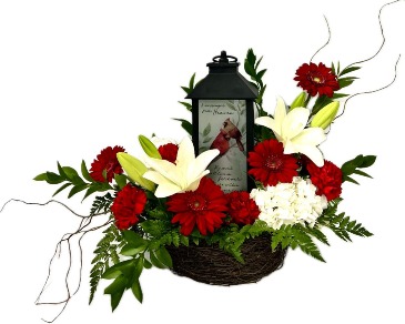 A Messenger from Heaven  Floral with lantern in Queensbury, NY | A LASTING IMPRESSION