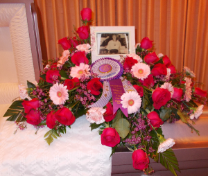 "A real Champion" casket spray