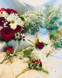 A Rose/ Babysbreath wedding rope wrapped