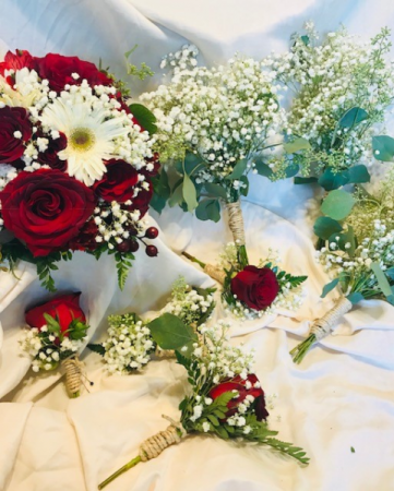 A Rose/ Babysbreath wedding rope wrapped