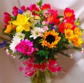 "SUNNY AND BRIGHT"(E) FLOWERS ARRANGED IN A VASE! mixed seasonal flowers depending on stock flowers may vary