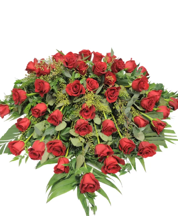 k640 Crimson Embrace All Rose Casket Spray Casket Spray in Park Ridge, IL | KIKOS FLOWERS AND GIFTS