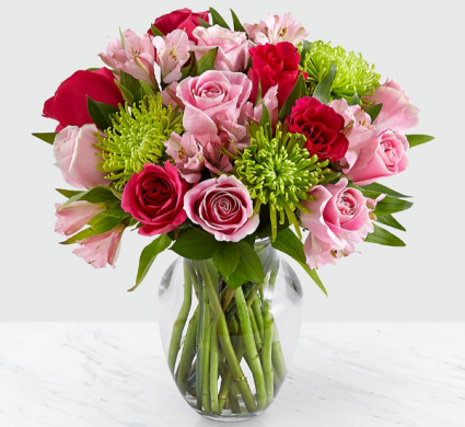 ALL THE FRILLS PINK AND GREEN FLOWERS IN VASE