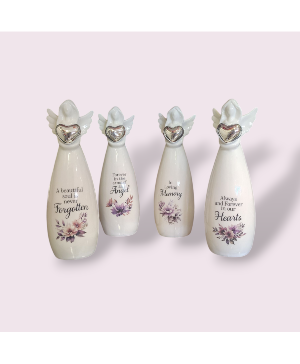 Angel with silver heart and sayings in arrangement Gift