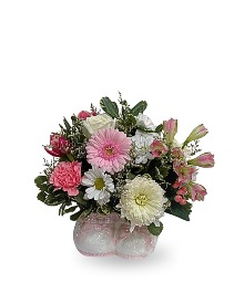 Baby Girl Blooms & Booties Arranged Flowers in Keepsake Ceramic Container