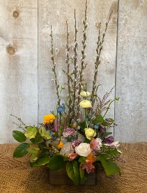 Sweet Blooms and Easter Eggs  arrangemement in a wooden box 