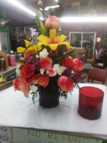 Beautiful red cilender  Mix of beautiful flowers