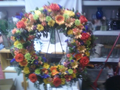 Beautiful Round Wreath with a mixture  (S) of colors. We need a few days  notice.