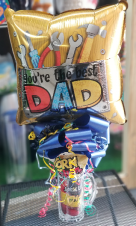 BEER MUG GOODIE ARRANGEMENT  Balloon and beer mug filled with goodies 