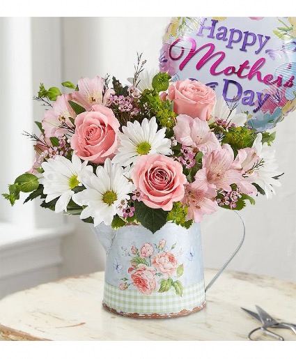 Watering can with pink roses 