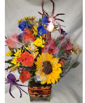 HALLOWEEN DELIGHT...cute ribbon   (HA) deal on vase arranged with bright fall flowers ans Halloween trim!