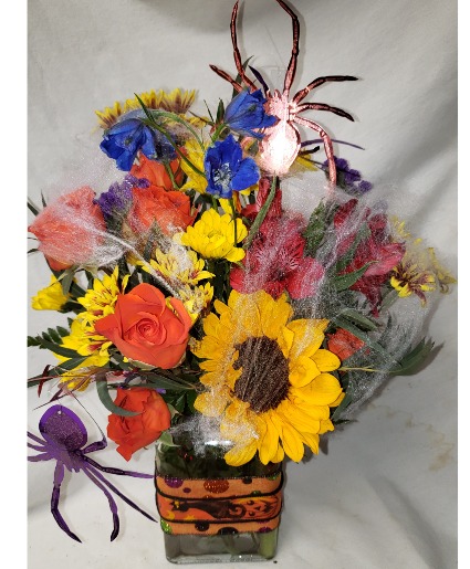 HALLOWEEN DELIGHT...cute ribbon   (HA) deal on vase arranged with bright fall flowers ans Halloween trim!
