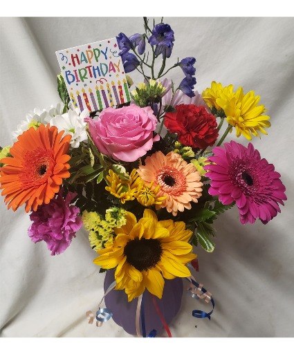 BIRTHDAY BLOOMS..MINI GERBERA DAISIES AND (B) And other bright flowers arranged in vase with Happy Birthday pick