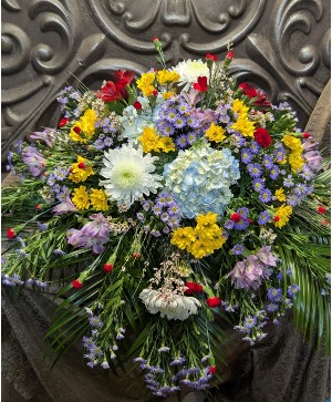 Blooming garden casket spray  Casket spray