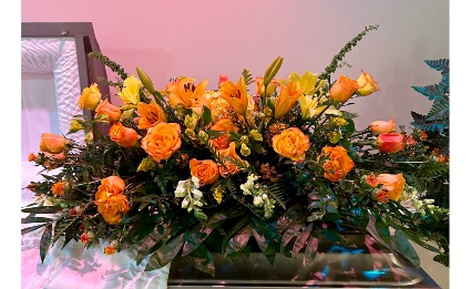 Blooming with Love Casket Spray