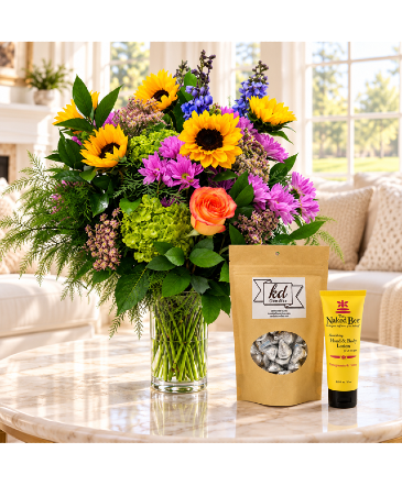 Blooms and Blessings Mixed Floral with Sunflowers, Candy & Naked Bee Lotion  in Plainview, TX | Kan Del's Floral, Candles & Gifts