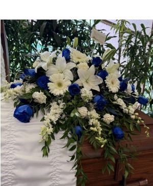 Blue and white casket arrangement 