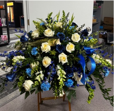 Blue Candlelight Sunrise Casket Spray in Woodville, TX | PB Designs Flower Shop & Gifts