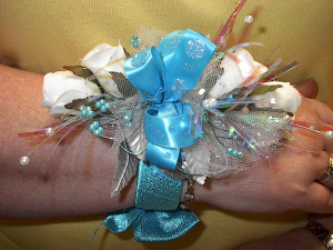 Blue for you wrist corsage in Kenton, OH - BLOSSOM GALLERY FLORIST