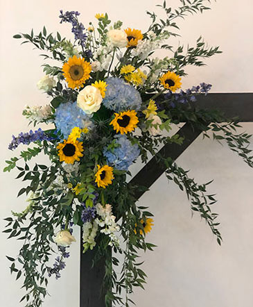 Blue Sky & Sunflowers Altar Arrangement in Jacksonville, FL | Gladwell's Florist