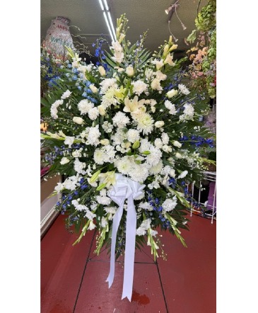 Blue & White Standing Spray Sympathy in Mcallen, TX | Marylu's Flowers and Gifts