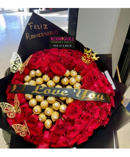 R15: Bouquet or roses and chocolates 100 red roses with a heart in the middle made with chocolates