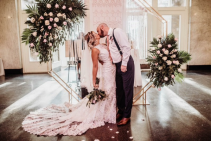 Brides  of roses and eucalyptus w/matching Arbor