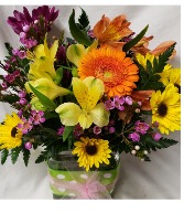 Pick- Me -Up bouquet..(E).rectangular vase With ribbon detail and seasonal bright flowers arranged