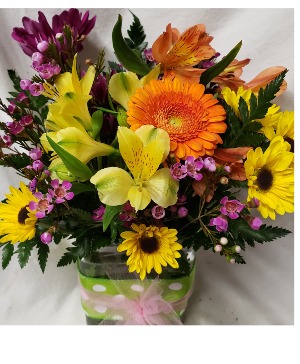  Pick- Me -Up bouquet..(E).rectangular vase With ribbon detail and seasonal bright flowers arranged