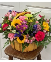 Bring on Spring All around arrangement in a basket
