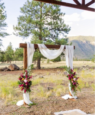 Buffalo Park Flowers and Arch Drape  in Flagstaff, AZ | Floral Arts of Flagstaff