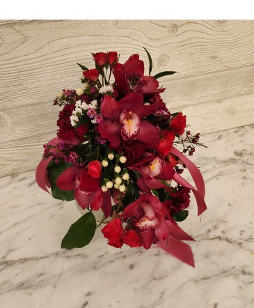 Burgundy orchid nosegay Handheld Bouquet in Evanston, IL | West End Florist & Garden Center