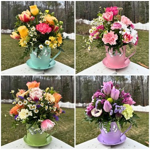 Butterfly Kisses Teacup Flower arrangement in metal planter