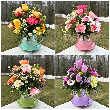 Butterfly Kisses Teacup Flower arrangement in metal planter