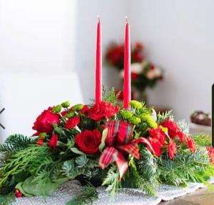 By the candlelight centerpiece  