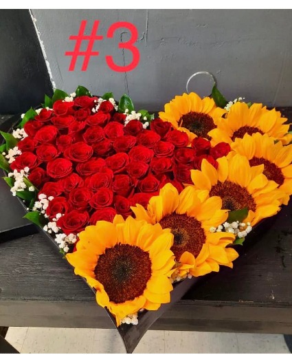 CAJA DECORAZON ROSAS YGIRASOL  beautiful arrangement with roses and sunflowers.