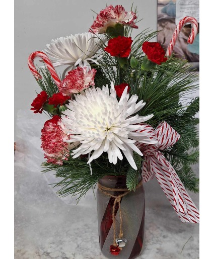 Candy stripe glass jar with candy canes 