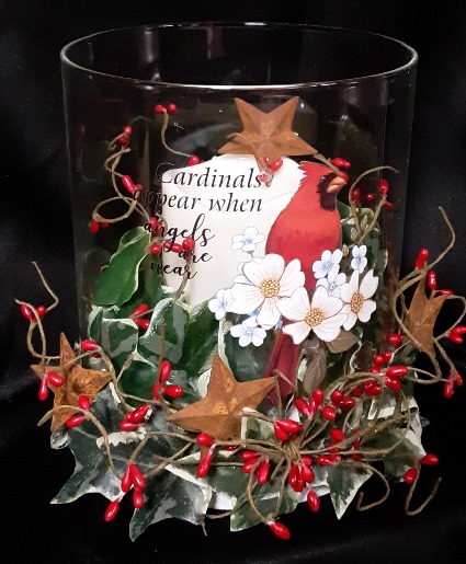 Cardinals appear glass globe and candle arrangement