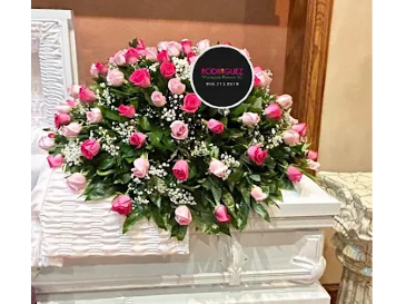 Casket Spray: Hot pink and pink roses * Color of roses may be changed in Mcallen, TX | Rodriguez Wholesale Flowers