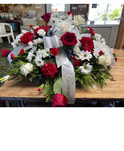 Casket spray in  Reds & Whites Casket piece 