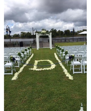 CEREMONY FLOWERS PETALS AND ARBOR WEDDING FLOWERS