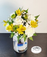 Cheerful Giver Long Lasting Flowers on a Candle.